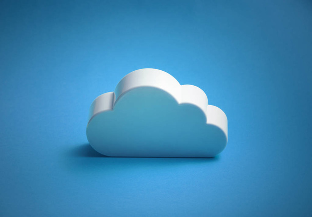 White cloud shape over blue background  - Fotó, kép