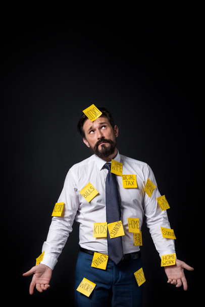 stressed businessman with sticky notes - Photo, Image