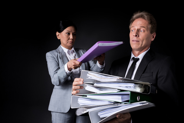 business colleagues with folders - Foto, afbeelding