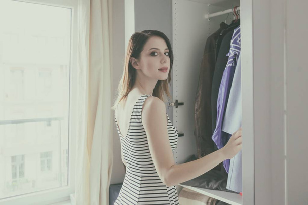 woman choosing clothes - Foto, Bild