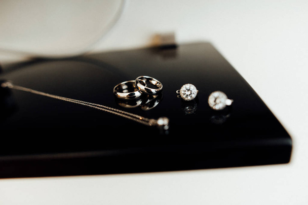 Jewels on black desk  - Фото, зображення