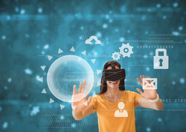Happy woman in VR headset touching interfaces against blue background with flares - Φωτογραφία, εικόνα