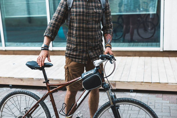 Unrecognizable Cyclist Man With Bicycle Walking On Street - Фото, зображення