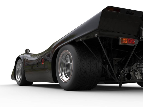 Уголь черный винтажный гоночный автомобиль - заднее колесо крупным планом
 - Фото, изображение