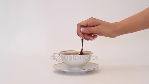 Close up of tea with person - Záběry, video