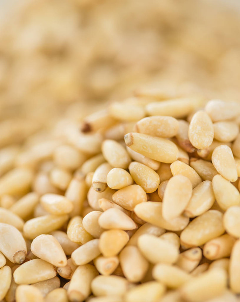 Portion of fresh Pine Nuts - Photo, image