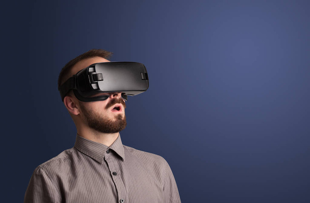 Businessman with virtual reality goggles - Foto, Imagem