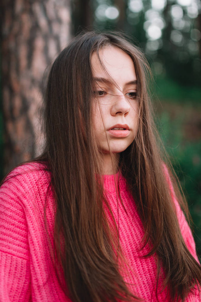 Young beautiful teenage girl in the forest - Фото, зображення