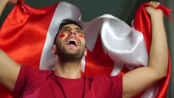 Canadian Guy Celebrating with Canada Flag - Footage, Video