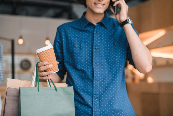 young man with shopping bags - Photo, Image