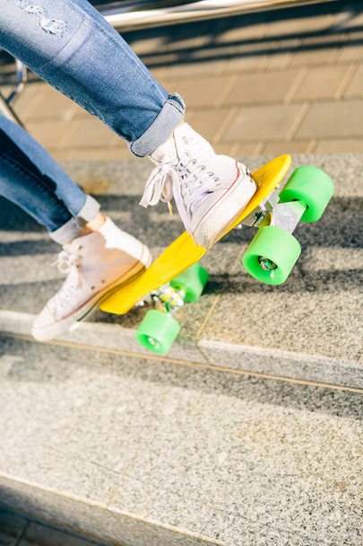 Girl with penny skateboard shortboard. - 写真・画像
