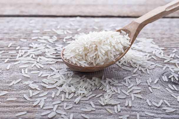 raw rice in a spoon - Zdjęcie, obraz