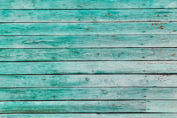 Old green shabby wooden planks with cracked color paint - Valokuva, kuva