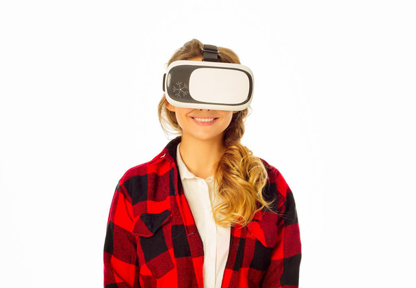 Young attractive woman wearing VR headset glasses of virtual rea - Fotoğraf, Görsel