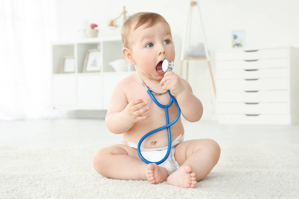 Cute little baby with stethoscope  - Φωτογραφία, εικόνα