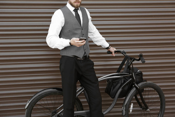 Young man with bicycle  - Zdjęcie, obraz