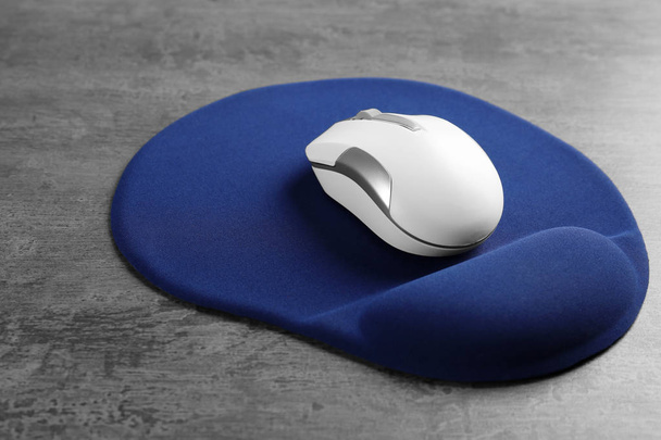 Blank mat and wireless mouse   - Fotoğraf, Görsel