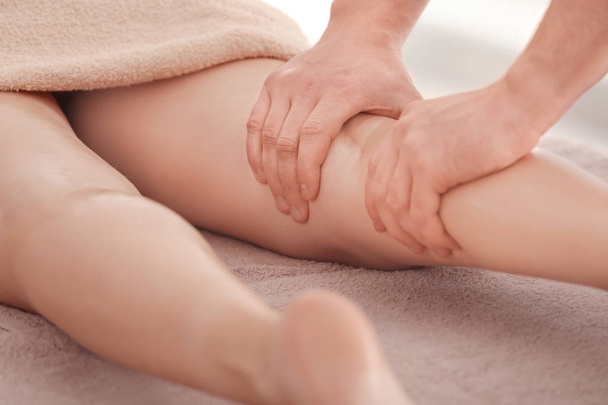 Young woman having legs massage  - Foto, immagini