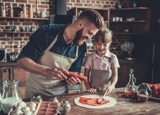 Dad and daughter cooking - Photo, Image