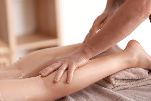 Young woman having legs massage - Zdjęcie, obraz