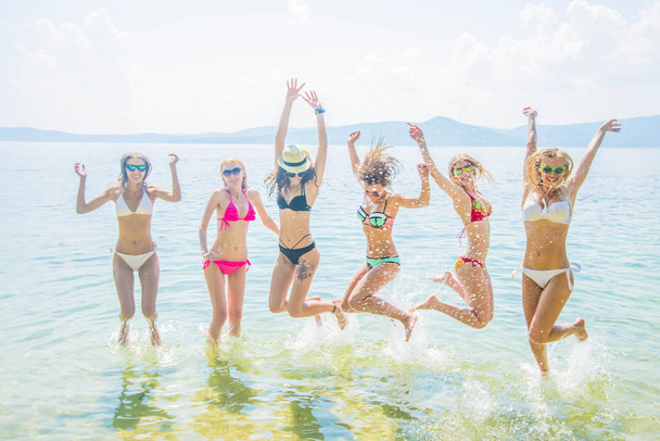 view of Group of Friends Having Fun on Tropical Beach in  summer. summer time - Фото, изображение