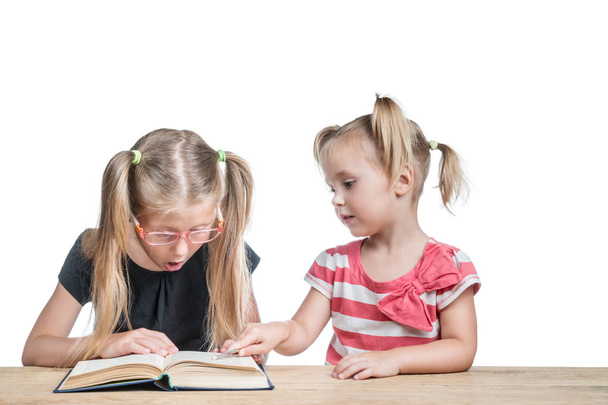 Children study the book - Foto, immagini