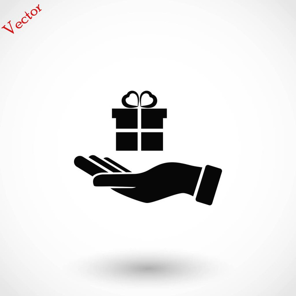 Значок руки и подарков
 - Вектор,изображение