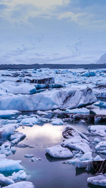 sun light reflecting on iceberg glacier lagoon, jokulsarlon of Iceland - 写真・画像