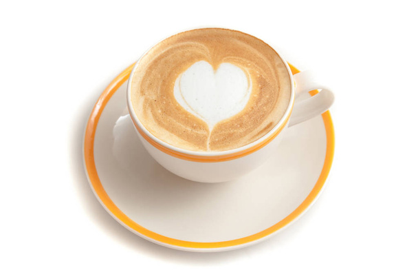 分離した白い背景にカフェラテ アート ハートのコーヒー カップ - 写真・画像