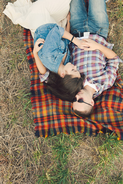 Young modern stylish couple outdoors - 写真・画像
