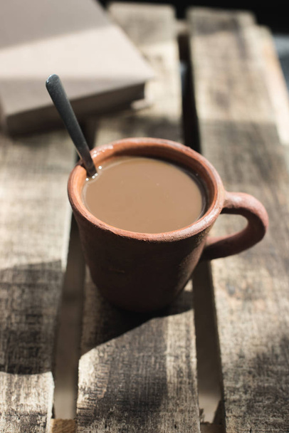  Clay cup of coffee with milk  - Фото, изображение