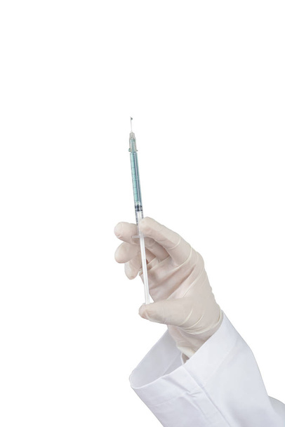Ruka lékaře drží lékařské injekční stříkačka - Fotografie, Obrázek