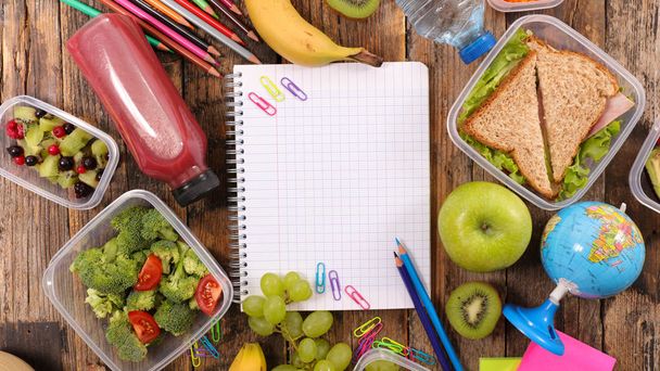 notebook surrounded by healthy food - Fotoğraf, Görsel