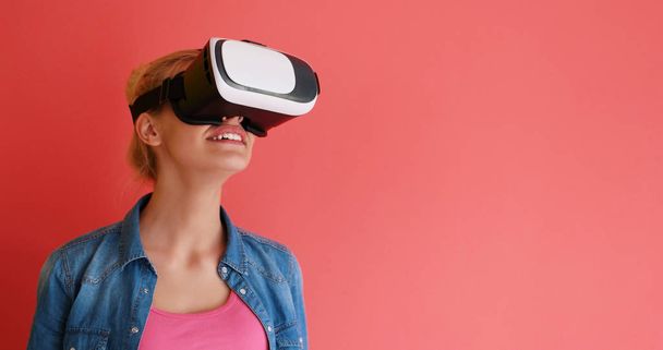 young girl using VR headset glasses of virtual reality - Φωτογραφία, εικόνα