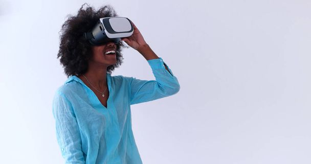 black girl using VR headset glasses of virtual reality - Photo, image