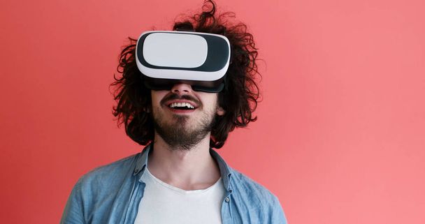 young man using VR headset glasses of virtual reality - Foto, Bild