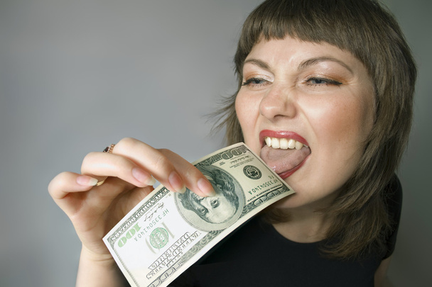 Bizarre woman. Taste of the money. - Photo, Image