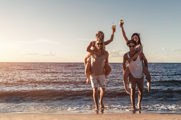 Group of friends on beach - Photo, image