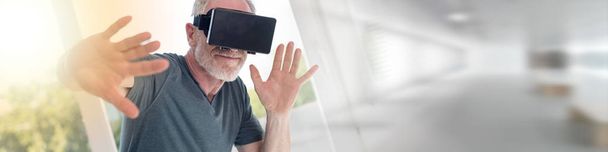 Man using a virtual reality headset, light effect - Photo, Image