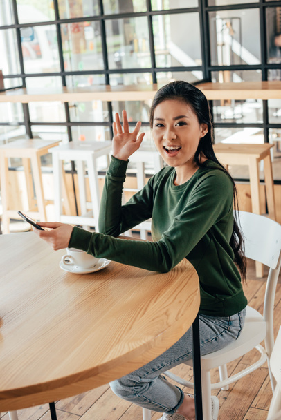asian woman sitting in cafe - Photo, Image