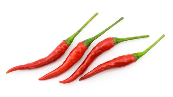 Hot chili pepper or small chili padi, line up, isolated on white - Foto, immagini