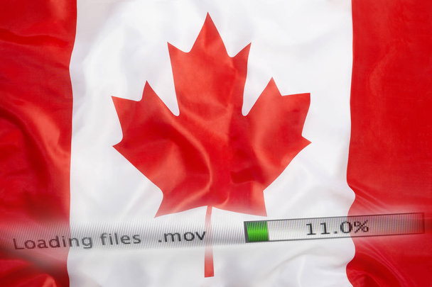 Λήψη αρχείων σε έναν υπολογιστή, η σημαία του Καναδά - Φωτογραφία, εικόνα