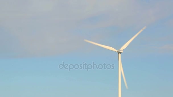 Windmill propellers spinning. Green energy generation. - Footage, Video