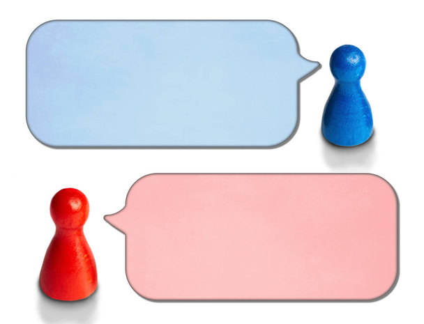 Szögbenálló beszéd buborékok elszigetelt fehér background játék figurákat. A vita, a beszélgetés, a kommunikáció fogalma. - Fotó, kép