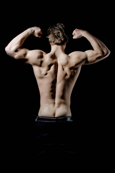 man with sexy muscular body and back posing as bodybuilder - Fotografie, Obrázek