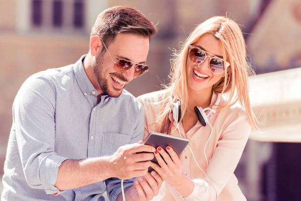Young couple using tablet - Photo, Image