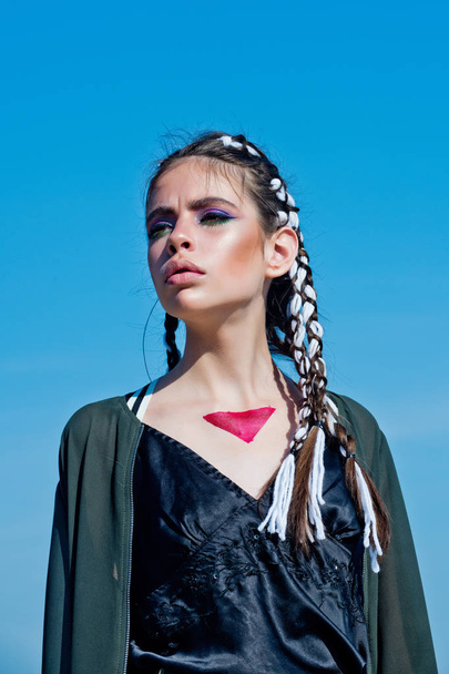 woman with makeup and hairstyle on blue sky - Φωτογραφία, εικόνα