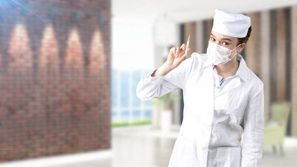 Beautiful medical woman doctor in uniform. Studio painted background. Concept of profitable health care. - Foto, Imagem