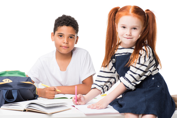 multiethnic schoolkids studying together  - Фото, изображение