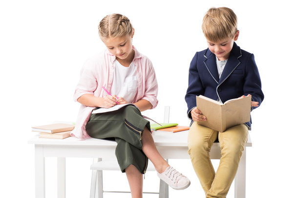 adorable schoolkids studying together - Фото, изображение